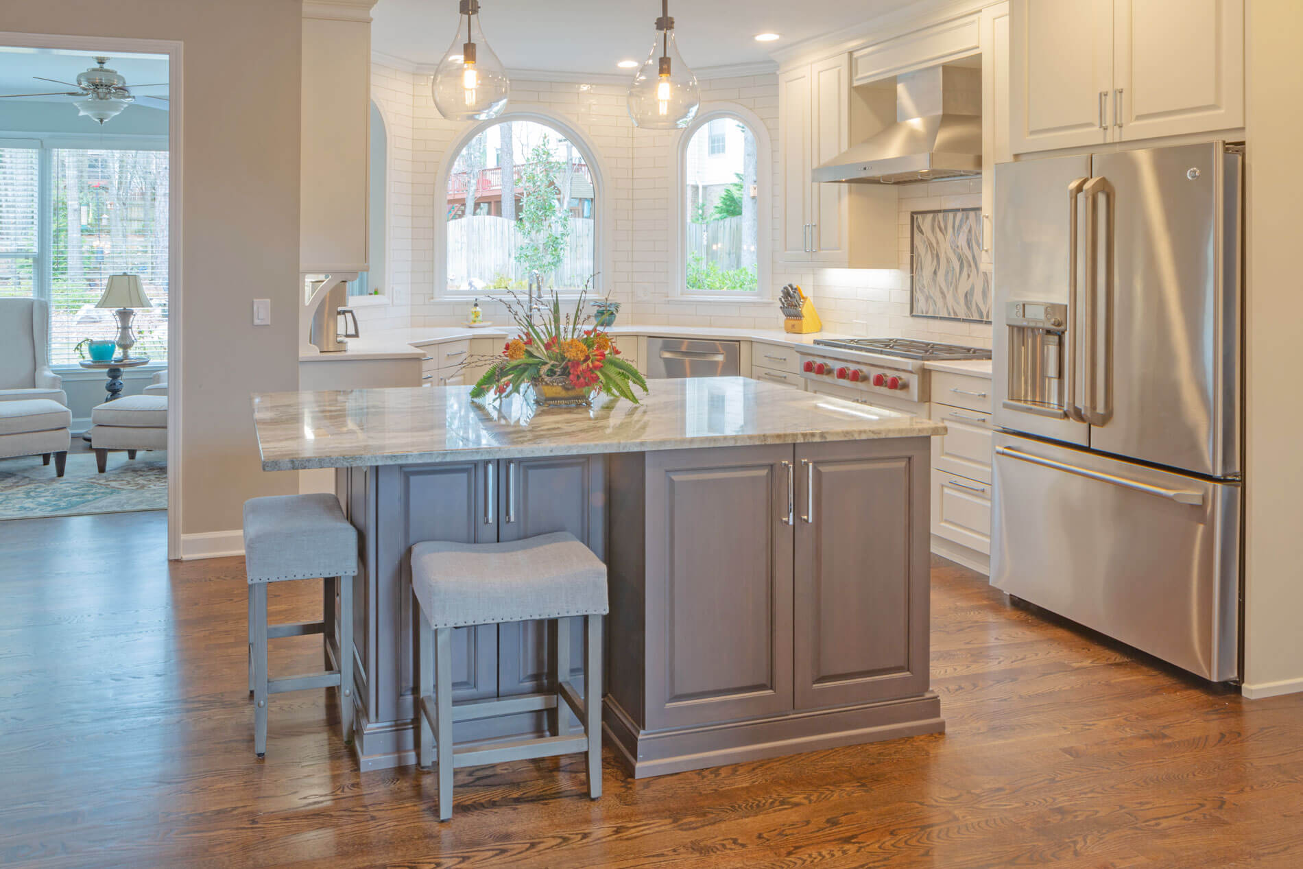 Modern luxury kitchen design by Cheryl Pett featuring custom cabinets in Alpharetta - Cheryl Pett Design